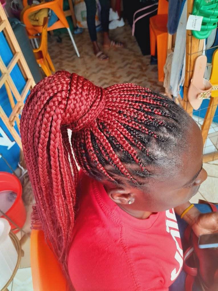 Hero background image of a stylish Kenyan woman