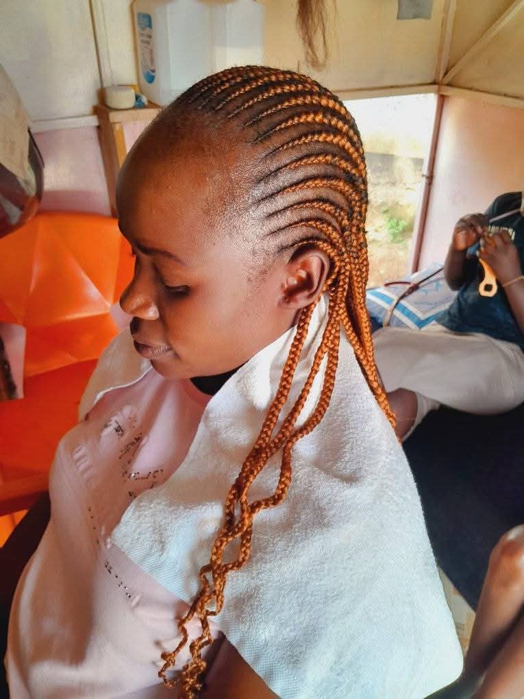 Hero background image of a stylish Kenyan woman